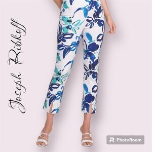 Joseph Ribkoff Fun summer floral print flared pants with front slit detail.